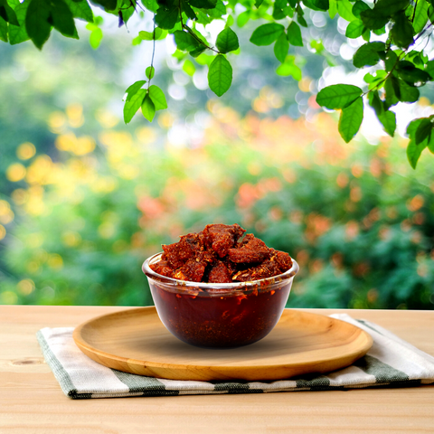 A bowl filled with spicy chunks of marinated mutton.
