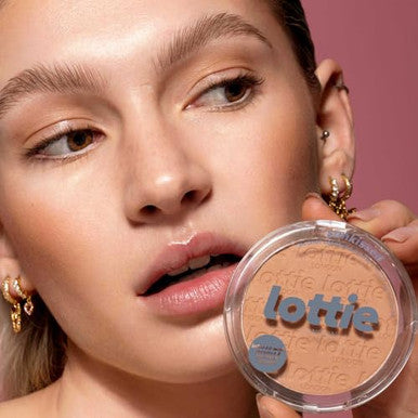 Lottie London Sunkissed Bronzer In Sunburst Infused With Bamboo Extract And Vitamin E This Skin-Loving Bronzer Adds A Buildable Warm Bronze For A Defined Finish