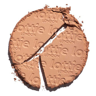 Lottie London Sunkissed Bronzer In Sunburst Infused With Bamboo Extract And Vitamin E This Skin-Loving Bronzer Adds A Buildable Warm Bronze For A Defined Finish