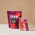 Cure Hydrating Electrolyte Mix | Electrolyte Powder for Dehydration Relief | Made with Coconut Water | No Added Sugar | Vegan | Paleo Friendly | Grapefruit + Berry Pomegranate Bundle | 28 Packets