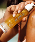 Kopari Sun Shield Body Glow SPF 50 UV Protection Sheer Mineral Sunscreen Gold Shimmer Mica Sweat and Water Resistant Antioxidant Vitamin E