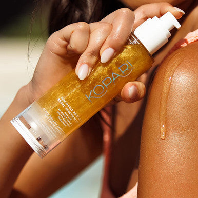 Kopari Sun Shield Body Glow SPF 50 UV Protection Sheer Mineral Sunscreen Gold Shimmer Mica Sweat and Water Resistant Antioxidant Vitamin E