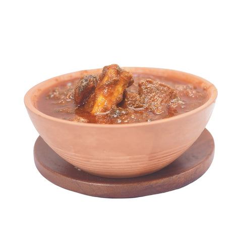 A traditional Indian pickle made with Gongura leaves and tender mutton.